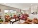 Spacious living room with comfortable seating and view to the backyard at 15752 Matthews Ln, Noblesville, IN 46060