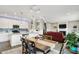 Open-concept living space combining kitchen, dining, and living room, perfect for entertaining at 15752 Matthews Ln, Noblesville, IN 46060