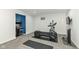 Basement with home fitness area, including exercise machine and space for floor exercises at 15898 Bounds Dr, Noblesville, IN 46062