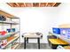 Basement area featuring shelving, storage containers, and a rec area for games and activities at 15898 Bounds Dr, Noblesville, IN 46062