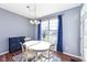 Cozy breakfast nook featuring a table with seating for four and a sunny window view at 15898 Bounds Dr, Noblesville, IN 46062