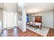 Elegant dining room with wood floors, white walls, and a classic chandelier at 15898 Bounds Dr, Noblesville, IN 46062