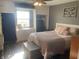 Bright bedroom with storage and a window seat presents a versatile and inviting space at 17245 N 200 E, Summitville, IN 46070