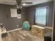 Bedroom featuring vinyl floors, natural light, and comfortable decor at 17245 N 200 E, Summitville, IN 46070