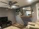 Comfortable living room with modern decor, ceiling fan, and plenty of room for relaxation at 17245 N 200 E, Summitville, IN 46070