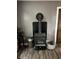 Wood burning stove stands as the centerpiece of the living area, offering warmth and rustic charm at 17245 N 200 E, Summitville, IN 46070