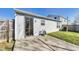 A private concrete patio, perfect for outdoor dining or relaxing, is accessible from the house through a sliding door at 1850 Blue Pine Ln, Indianapolis, IN 46231