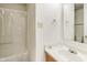 Bright bathroom featuring a white sink vanity, a toilet and a shower with a curtain at 1850 Blue Pine Ln, Indianapolis, IN 46231
