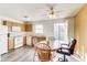 Bright dining area with natural light and an open design connecting to the kitchen at 1850 Blue Pine Ln, Indianapolis, IN 46231