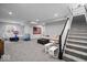 Spacious finished basement featuring neutral decor, plush carpeting, and a cozy seating area at 19036 Karyn Ln, Noblesville, IN 46062