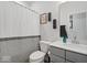 Well-maintained bathroom with a shower and gray vanity at 19036 Karyn Ln, Noblesville, IN 46062