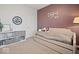 Charming bedroom with daybed, soft carpet, a clock, and a decorative name art piece at 19036 Karyn Ln, Noblesville, IN 46062