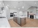 Modern kitchen with stainless steel appliances, a spacious island, and plenty of storage space at 19036 Karyn Ln, Noblesville, IN 46062