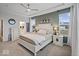 Serene main bedroom with tray ceiling, natural light, and neutral tones at 19036 Karyn Ln, Noblesville, IN 46062
