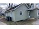 Picture of the side and back of a light green, single-story home with a small porch at 1904 S Rosemont Ave, Muncie, IN 47302