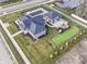 Aerial view of a home with a pool, patio and bocce court at 19350 Goins Blvd, Westfield, IN 46074
