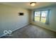 Empty bedroom with neutral walls and a bright window at 19350 Goins Blvd, Westfield, IN 46074
