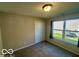 Bedroom has a double-door closet and a bright window at 19350 Goins Blvd, Westfield, IN 46074