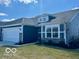 Charming home showcasing clean lines, light-filled windows, and a well-maintained yard on a sunny day at 19350 Goins Blvd, Westfield, IN 46074