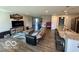 Spacious open-plan living area featuring a view into the kitchen, ideal for modern living and socializing at 19350 Goins Blvd, Westfield, IN 46074
