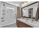Stylish bathroom with double sinks, modern fixtures, tub and shower at 1945 Carrollton Ave, Indianapolis, IN 46202