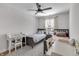 Bright bedroom featuring twin beds, a desk, and ample natural light at 1945 Carrollton Ave, Indianapolis, IN 46202