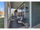 Inviting front porch with seating area, perfect for relaxing and enjoying the outdoors at 1945 Carrollton Ave, Indianapolis, IN 46202