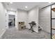 Finished hallway with playroom and a staircase at 1945 Carrollton Ave, Indianapolis, IN 46202