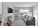 Charming living room featuring a cozy sofa and natural light at 1945 Carrollton Ave, Indianapolis, IN 46202