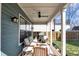 Outdoor patio features a ceiling fan and furniture at 1945 Carrollton Ave, Indianapolis, IN 46202