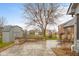 Large patio with brick accents, fire pit, and outdoor seating in a well-maintained backyard at 2054 Partridge Dr, Franklin, IN 46131