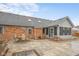 Spacious backyard featuring a brick patio and a screened-in porch at 2054 Partridge Dr, Franklin, IN 46131