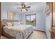 Cozy bedroom featuring a seaside themed comforter, neutral carpet and a wood-trimmed window at 2054 Partridge Dr, Franklin, IN 46131