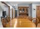 Spacious dining room with a wooden table set and built-in hutch at 2054 Partridge Dr, Franklin, IN 46131