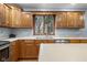 The kitchen boasts wood cabinets and an eat-in bar area at 2054 Partridge Dr, Franklin, IN 46131