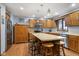Traditional kitchen with oak cabinets, stainless steel appliances, and an island with seating at 2054 Partridge Dr, Franklin, IN 46131