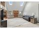 Spacious living room featuring brick fireplace, skylights, and cozy seating, ideal for relaxation at 2054 Partridge Dr, Franklin, IN 46131
