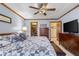 Main bedroom featuring a tray ceiling, walk-in closet, and ensuite at 2054 Partridge Dr, Franklin, IN 46131