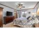 A spacious main bedroom with a sitting area and private bathroom at 2054 Partridge Dr, Franklin, IN 46131