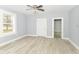 Bright living space with wood floors and neutral paint, ready for personalization at 209 Pennsylvania St, Shirley, IN 47384