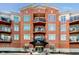 Beautiful brick condo building with private balconies and covered entrance at 20971 Shoreline Ct # 309, Noblesville, IN 46062