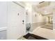 Hallway featuring unit door, tiled floors and modern decor at 20971 Shoreline Ct # 309, Noblesville, IN 46062