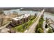 Aerial view of the property, lake and surrounding community featuring water access and green space at 20971 Shoreline Ct # Apt 212, Noblesville, IN 46062