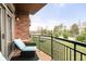 Cozy balcony features comfortable seating and a nice view of the surrounding landscape at 20971 Shoreline Ct # Apt 212, Noblesville, IN 46062