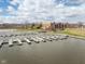 Community dock view with a view of the lake with water access and green space at 20971 Shoreline Ct # Apt 212, Noblesville, IN 46062
