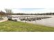 Community dock view with a view of the lake with water access and green space at 20971 Shoreline Ct # Apt 212, Noblesville, IN 46062