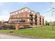 This condo building features multiple balconies and a secure fenced lawn area for residents to enjoy at 20971 Shoreline Ct # Apt 212, Noblesville, IN 46062