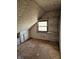 An attic featuring a window and hardwood floors at 21977 Craig Ave, Noblesville, IN 46060