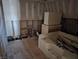An unfinished bathroom remodel with a bathtub at 21977 Craig Ave, Noblesville, IN 46060
