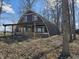 Quonset hut style home featuring an attractive front porch and unique architecture at 21977 Craig Ave, Noblesville, IN 46060